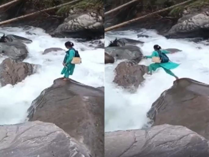nurse jumps into river during flood for vaccination in Himachal Pradesh viral video of brave nurse crossing river for duty in Mandi | भर पुरात मारली उडी, लसीकरणासाठी नर्सचे धाडस पाहून चुकेल काळजाचा ठोका! पाहा व्हायरल व्हिडिओ