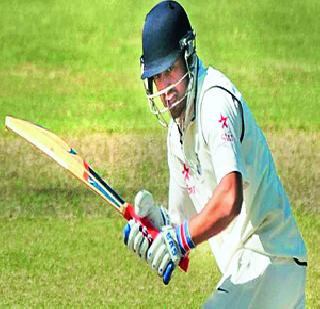 Karnataka grip a tough match | कर्नाटकची सामन्यावर मजबूत पकड