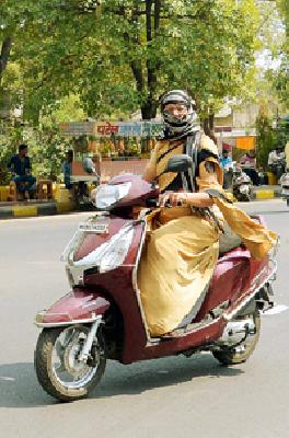 Madam ... helmet somewhere? : | मॅडम...हेल्मेट कुठंय? : Madam ... helmet somewhere? : | मॅडम...हेल्मेट कुठंय? :