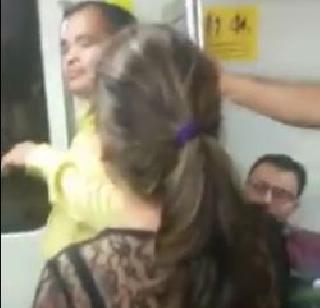 High-fashioned women wearing a pistol and a metro | दारू पिऊन मेट्रोत धिंगाणा घालताना उच्चभ्रू महिला High-fashioned women wearing a pistol and a metro | दारू पिऊन मेट्रोत धिंगाणा घालताना उच्चभ्रू महिला