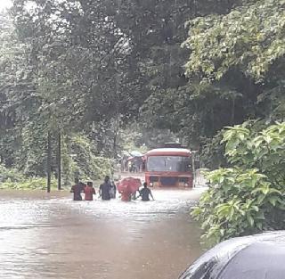 Driver s T. Just put it in the flood water and ... | चालकाने एस. टी. बस पुराच्या पाण्यात घातली अन्... Driver s T. Just put it in the flood water and ... | चालकाने एस. टी. बस पुराच्या पाण्यात घातली अन्...