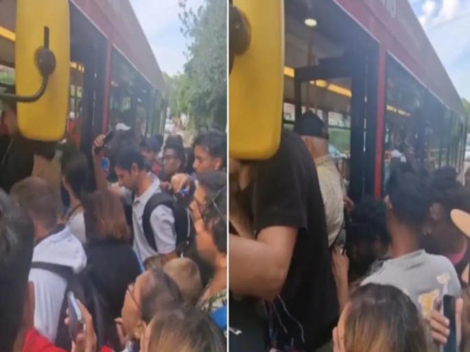People jumping over each other to board a bus in London video viral | VIDEO: ही मुंबई नाही लंडन आहे! बसमध्ये चढण्यासाठी एकमेकांच्या अंगावरुन गेले प्रवासी People jumping over each other to board a bus in London video viral | VIDEO: ही मुंबई नाही लंडन आहे! बसमध्ये चढण्यासाठी एकमेकांच्या अंगावरुन गेले प्रवासी