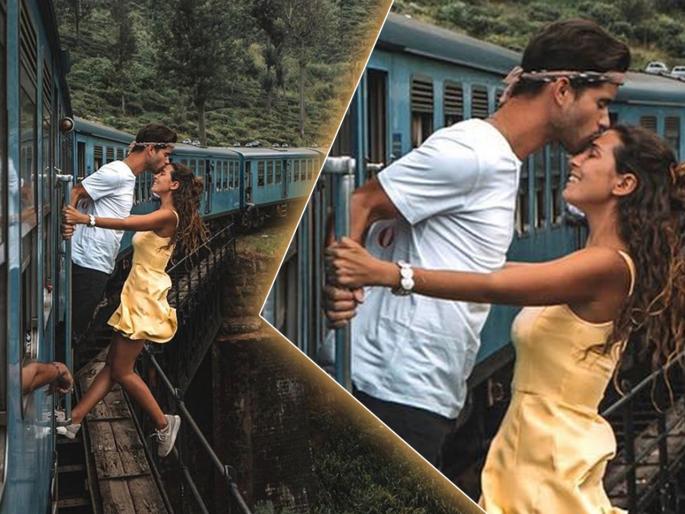 This couple slammed for irresponsible train photoshoot pics goes viral | कपलचा रोमॅन्टीक फोटो व्हायरल; पण नेटकऱ्यांची कौतुकासोबत टीकेची झोड This couple slammed for irresponsible train photoshoot pics goes viral | कपलचा रोमॅन्टीक फोटो व्हायरल; पण नेटकऱ्यांची कौतुकासोबत टीकेची झोड