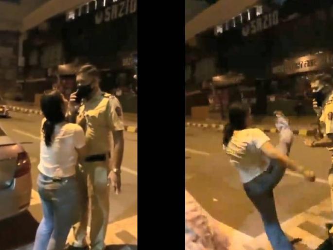 Video: Drunk woman kicks police and grabs his collar in Navi mumbai | Video : मद्यधुंद तरुणीने पोलिसावर लाथ उगारली अन् पकडली, भररस्त्यात केला तमाशा Video: Drunk woman kicks police and grabs his collar in Navi mumbai | Video : मद्यधुंद तरुणीने पोलिसावर लाथ उगारली अन् पकडली, भररस्त्यात केला तमाशा
