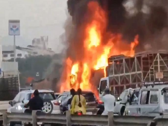 Car caught in two containers in Pune, fire breaks out, accident near Navale Bridge area; 8 killed, including a 3-year-old child, 22 injured | पुण्यात दोन कंटेनरमध्ये कार सापडून आगीचे तांडव, नवले पूल परिसरात अपघात; ३ वर्षांच्या चिमुकलीसह ८ ठार, २२ जखमी Car caught in two containers in Pune, fire breaks out, accident near Navale Bridge area; 8 killed, including a 3-year-old child, 22 injured | पुण्यात दोन कंटेनरमध्ये कार सापडून आगीचे तांडव, नवले पूल परिसरात अपघात; ३ वर्षांच्या चिमुकलीसह ८ ठार, २२ जखमी