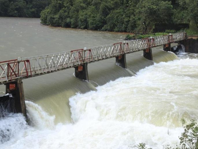 Two gates of Radhanagari Dam reopened, 7312 cusecs start of water discharge | कोल्हापूरकरांच्या चिंतेत वाढ, राधानगरी धरणाचे पाच स्वयंचलित दरवाजे खुले Two gates of Radhanagari Dam reopened, 7312 cusecs start of water discharge | कोल्हापूरकरांच्या चिंतेत वाढ, राधानगरी धरणाचे पाच स्वयंचलित दरवाजे खुले