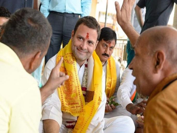 Modi's Modi announcement came out of the crowd when Rahul Gandhi came out of the temple | राहुल गांधी मंदिरातून बाहेर पडताच गर्दीतून आल्या मोदी मोदींच्या घोषणा Modi's Modi announcement came out of the crowd when Rahul Gandhi came out of the temple | राहुल गांधी मंदिरातून बाहेर पडताच गर्दीतून आल्या मोदी मोदींच्या घोषणा