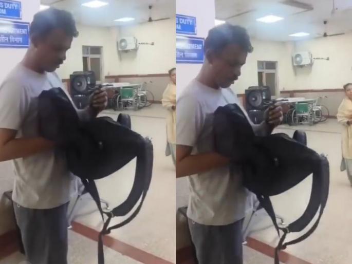 Rajasthan Man walks into hospital with snake, Video Goes Viral | Viral Video: धापा टाकत रुग्णालयात पोहोचला, डॉक्टरांनी विचारताच उघडली बॅग, पाहून अनेकांची बोलती बंद! Rajasthan Man walks into hospital with snake, Video Goes Viral | Viral Video: धापा टाकत रुग्णालयात पोहोचला, डॉक्टरांनी विचारताच उघडली बॅग, पाहून अनेकांची बोलती बंद!