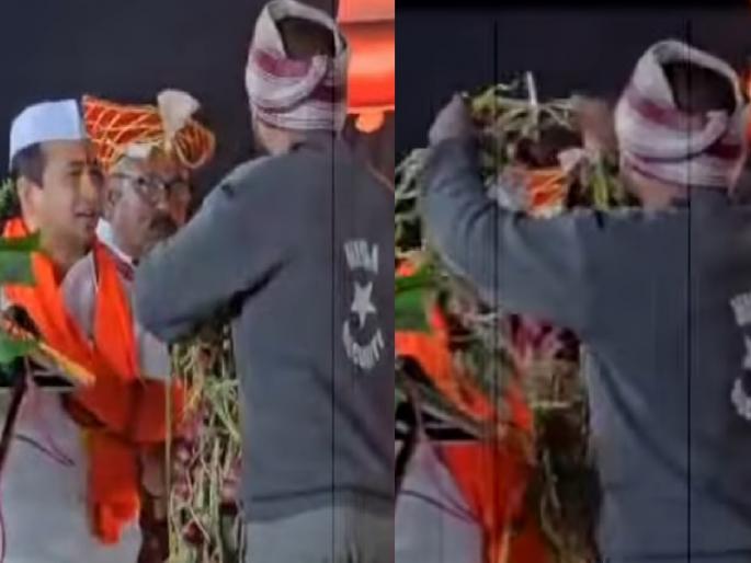 A farmer put a garland of onions around Minister Nitesh Rane neck in nashik, the police were shocked | मंत्री नितेश राणेंच्या गळ्यात शेतकऱ्याने घातली कांद्यांची माळ, पोलिसांची उडाली तारांबळ
