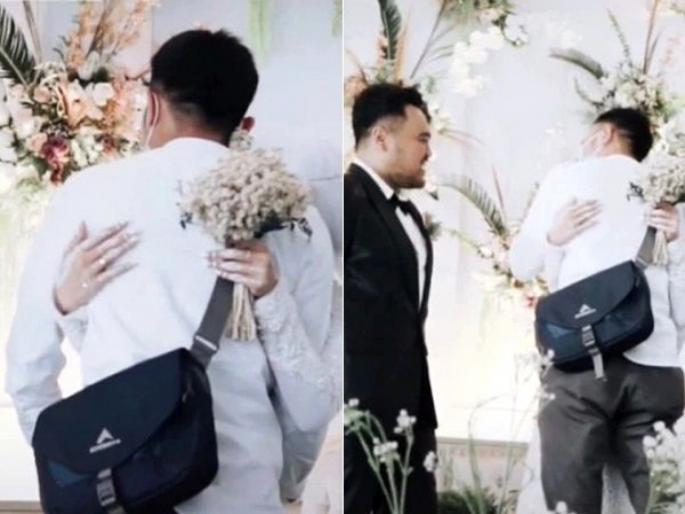 Indonesian bride hug ex boyfriend at wedding front of his husband after permission watch video | VIDEO : लग्नात पोहोचला एक्स-बॉयफ्रेन्ड, पतीसमोरच नवरीने मारली त्याला मिठी.... Indonesian bride hug ex boyfriend at wedding front of his husband after permission watch video | VIDEO : लग्नात पोहोचला एक्स-बॉयफ्रेन्ड, पतीसमोरच नवरीने मारली त्याला मिठी....