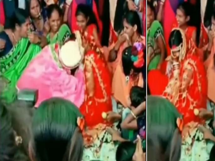 Wedding video groom bride kissing video viral on internet | Viral Video : बाबो! मंडपात बसलेल्या नवरीला Kiss करू लागला नवरदेव, बघून लाजल्या आजूबाजूच्या महिला Wedding video groom bride kissing video viral on internet | Viral Video : बाबो! मंडपात बसलेल्या नवरीला Kiss करू लागला नवरदेव, बघून लाजल्या आजूबाजूच्या महिला