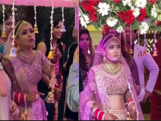 the bride stops dancing as she wants to play her favorite song, video goes viral | लग्नमंडपात या नवरीनं धरला भलताच हट्ट, तिचे नखरे पाहुन वऱ्हाडी झाले अवाक् अन् मग... the bride stops dancing as she wants to play her favorite song, video goes viral | लग्नमंडपात या नवरीनं धरला भलताच हट्ट, तिचे नखरे पाहुन वऱ्हाडी झाले अवाक् अन् मग...