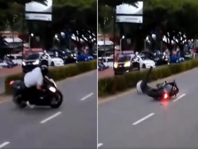Man was doing stunts on bike by wearing helmet then saved life like this in 6 seconds | VIDEO : बाइकवर करत होता खतरनाक स्टंट, पुढे जे झालं ते बघून अंगावर येईल काटा! Man was doing stunts on bike by wearing helmet then saved life like this in 6 seconds | VIDEO : बाइकवर करत होता खतरनाक स्टंट, पुढे जे झालं ते बघून अंगावर येईल काटा!
