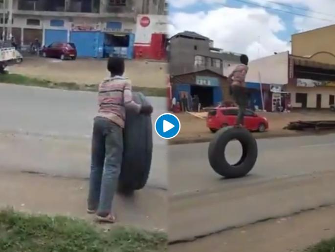 Man walks on truck tyre stunts goes viral ips gives epic reaction watch video | बापरे! भर रस्त्यात ट्रकच्या टायरवर चढून तरूणाचा खतरनाक स्टंट; व्हिडीओ पाहून तुम्हीही हादराल Man walks on truck tyre stunts goes viral ips gives epic reaction watch video | बापरे! भर रस्त्यात ट्रकच्या टायरवर चढून तरूणाचा खतरनाक स्टंट; व्हिडीओ पाहून तुम्हीही हादराल