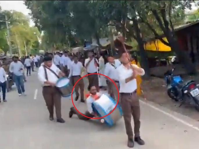 Uttar Pradesh : Volunteer who played drums during RSS roadshow dies of heart attack; Video goes viral | RSS च्या पथसंचलनात ढोल वाजवणाऱ्या स्वयंसेवकाचा हृदयविकाराने मृत्यू; व्हिडिओ व्हायरल