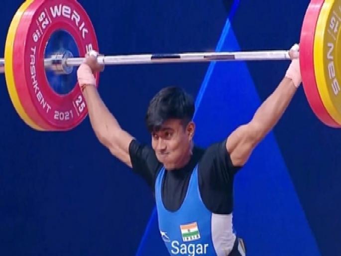 Sanket Mahadev Sargar won a gold medal in the 55 kg weight category at the World Commonwealth Weightlifting Championships | जागतिक कॉमनवेल्थमध्ये आष्ट्याच्या संकेत सरगरला सुवर्णपदक Sanket Mahadev Sargar won a gold medal in the 55 kg weight category at the World Commonwealth Weightlifting Championships | जागतिक कॉमनवेल्थमध्ये आष्ट्याच्या संकेत सरगरला सुवर्णपदक
