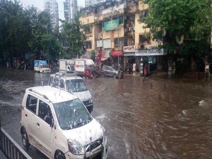 After the rest, the presence of rain again in Mumbai, the water collected in low lying areas | विश्रांतीनंतर मुंबईत पावसाची पुन्हा हजेरी, सखल भागांमध्ये साचलं पाणी After the rest, the presence of rain again in Mumbai, the water collected in low lying areas | विश्रांतीनंतर मुंबईत पावसाची पुन्हा हजेरी, सखल भागांमध्ये साचलं पाणी