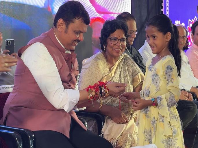 Devendra Fadnavis targets opponents who criticize Ladaki Bahin Yojana | चिमुकलीनं बांधली देवेंद्र फडणवीसांना राखी; म्हणाले, "बहिणीचं हे प्रेम कुणी..." Devendra Fadnavis targets opponents who criticize Ladaki Bahin Yojana | चिमुकलीनं बांधली देवेंद्र फडणवीसांना राखी; म्हणाले, "बहिणीचं हे प्रेम कुणी..."