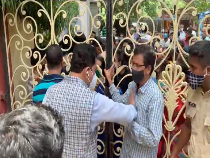 Video: Shivsena MP Rajan Vichare angry on Shiv Sainik; Confusion in corona vaccination program | Video: खासदार राजन विचारे संतापले अन् शिवसैनिकालाच मारले; कोरोना लसीकरण कार्यक्रमात गोंधळ Video: Shivsena MP Rajan Vichare angry on Shiv Sainik; Confusion in corona vaccination program | Video: खासदार राजन विचारे संतापले अन् शिवसैनिकालाच मारले; कोरोना लसीकरण कार्यक्रमात गोंधळ