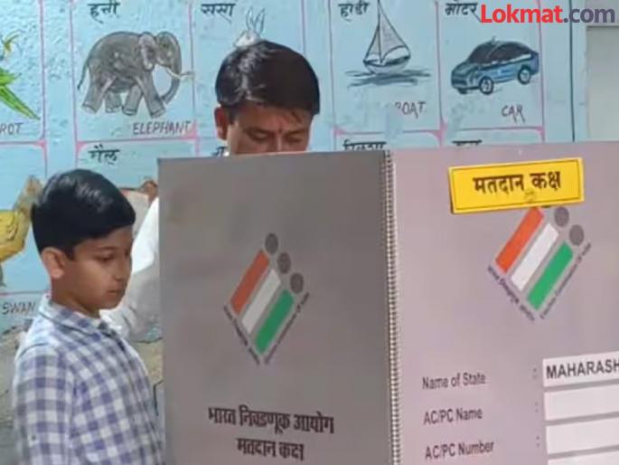 A child was allowed into the polling station with a candidate; Center president, police constable suspended, Election Commission slams | उमेदवारासोबत लहान मुलाला मतदान केंद्रात दिला प्रवेश; केंद्राध्यक्ष, पोलीस शिपाई निलंबित, निवडणूक आयोगाचा दणका A child was allowed into the polling station with a candidate; Center president, police constable suspended, Election Commission slams | उमेदवारासोबत लहान मुलाला मतदान केंद्रात दिला प्रवेश; केंद्राध्यक्ष, पोलीस शिपाई निलंबित, निवडणूक आयोगाचा दणका