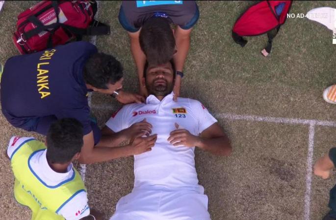 Karunaratne cops a bouncer from Cummins and has to be stretchered off after lengthy treatment on the field. | चिंताजनक; मानेवर चेंडू आदळल्यामुळे श्रीलंकेचा फलंदाज स्ट्रेचरवर, काळजाचा ठोका चुकला...