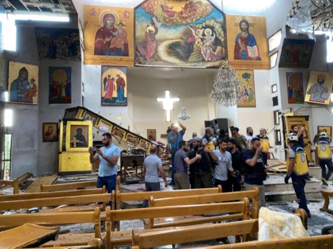 Suicide attack in Syrian church 22 killed 63 injured | चर्चेमध्ये घुसून गोळाबार केला अन् नंतर बॉम्बने स्वतःला उडवून दिले; सीरियात २२ जणांचा मृत्यू Suicide attack in Syrian church 22 killed 63 injured | चर्चेमध्ये घुसून गोळाबार केला अन् नंतर बॉम्बने स्वतःला उडवून दिले; सीरियात २२ जणांचा मृत्यू