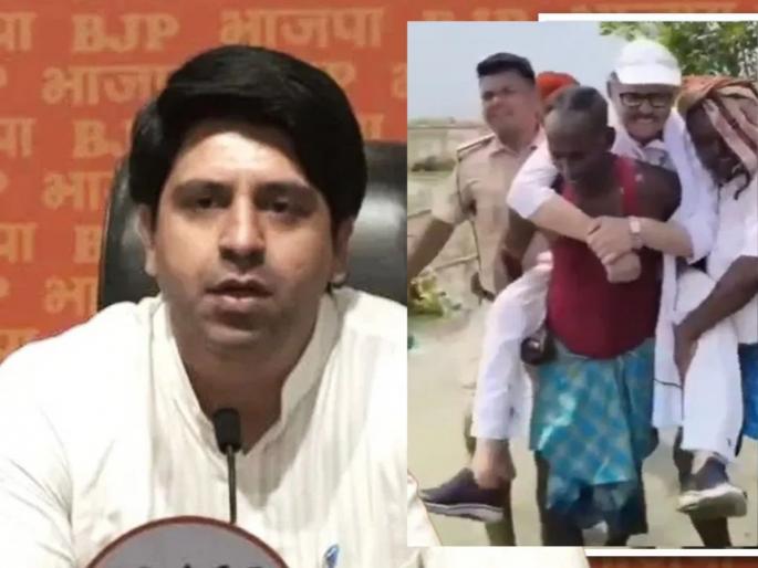 congress tariq anwar bihar flood- controversy bjp shehzad Poonawalla | पूरग्रस्त भागात गेलेल्या काँग्रेस खासदाराला ग्रामस्थांनी खांद्यावर घेतलं, भाजपाने Video वरुन घेरलं congress tariq anwar bihar flood- controversy bjp shehzad Poonawalla | पूरग्रस्त भागात गेलेल्या काँग्रेस खासदाराला ग्रामस्थांनी खांद्यावर घेतलं, भाजपाने Video वरुन घेरलं
