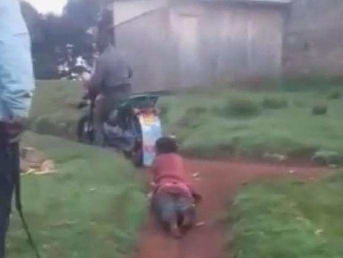 Disgrace to humanity! woman was tied to the bike and taken for a ride; Kenya | माणुसकीला काळीमा! पोलिसांनी महिलेला बाईकला बांधून फरफटत नेले; केनियातील कृत्य Disgrace to humanity! woman was tied to the bike and taken for a ride; Kenya | माणुसकीला काळीमा! पोलिसांनी महिलेला बाईकला बांधून फरफटत नेले; केनियातील कृत्य