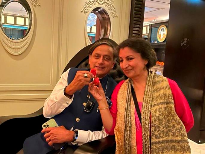 Shashi Tharoor shares photo on twitter with female novelist geetanjali shree users troll him amid Rahul Gandhi ED Enquiry Row | शशि थरूर यांनी लेखिकेसोबत स्ट्रॉबेरी खातानाचा फोटो केला पोस्ट, नेटकरी म्हणाले...