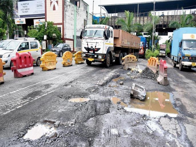 It is not right to charge toll for bad and potholed roads; Historic decision of Supreme Court on NHAI Toll Highway | खराब अन् खड्डेमय रस्त्यांसाठी टोल घेणे योग्य नाही; सुप्रीम कोर्टाचा ऐतिहासिक निर्णय It is not right to charge toll for bad and potholed roads; Historic decision of Supreme Court on NHAI Toll Highway | खराब अन् खड्डेमय रस्त्यांसाठी टोल घेणे योग्य नाही; सुप्रीम कोर्टाचा ऐतिहासिक निर्णय
