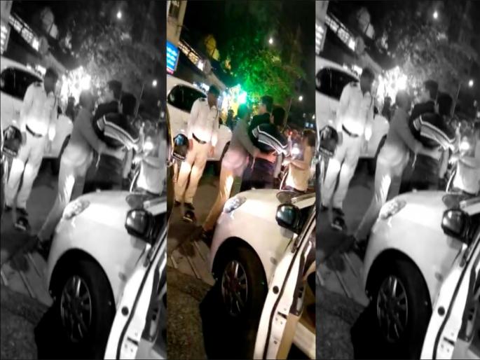 Video : Traffic Police assaulted by son and father duo; both are arrested | Video : वाहतूक पोलिसाला मुजोर बापा-लेकाने केली मारहाण Video : Traffic Police assaulted by son and father duo; both are arrested | Video : वाहतूक पोलिसाला मुजोर बापा-लेकाने केली मारहाण