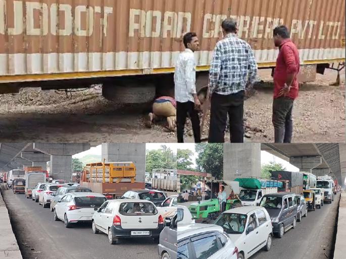 Pune Bengaluru National Highway blocked for an hour due to a large container stuck in a pothole in Malkapur satara | Satara: मलकापुरात कंटेनर खड्ड्यात अडकल्याने महामार्ग तीन तास ठप्प, खड्डे बुजवण्याचा भोंगळ कारभार Pune Bengaluru National Highway blocked for an hour due to a large container stuck in a pothole in Malkapur satara | Satara: मलकापुरात कंटेनर खड्ड्यात अडकल्याने महामार्ग तीन तास ठप्प, खड्डे बुजवण्याचा भोंगळ कारभार