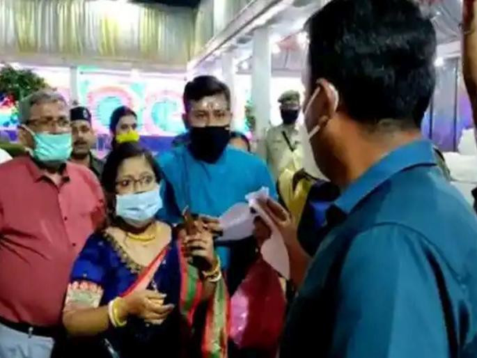 tripura west dm entered marriage hall and took action against groom for violating night curfew | VIDEO: चल बाहेर निघ! लग्न लागत असताना पोलीस आले मंडपात; धक्के मारत काढली नवरदेवाची 'वरात' tripura west dm entered marriage hall and took action against groom for violating night curfew | VIDEO: चल बाहेर निघ! लग्न लागत असताना पोलीस आले मंडपात; धक्के मारत काढली नवरदेवाची 'वरात'
