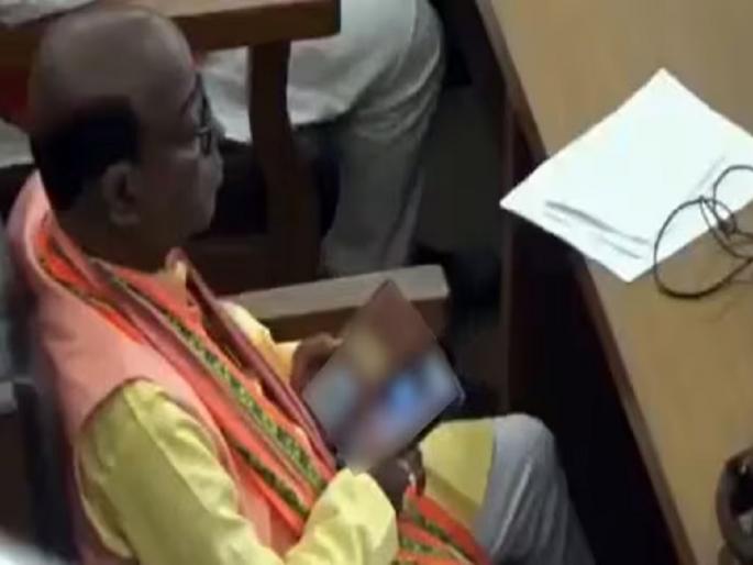 Tripura BJP MLA Jadab Lal Nath was allegedly caught watching video during the state Assembly session | अधिवेशनादरम्यान सभागृहात पाहिला पॉर्न व्हिडिओ; भाजप आमदारावर आरोप Tripura BJP MLA Jadab Lal Nath was allegedly caught watching video during the state Assembly session | अधिवेशनादरम्यान सभागृहात पाहिला पॉर्न व्हिडिओ; भाजप आमदारावर आरोप