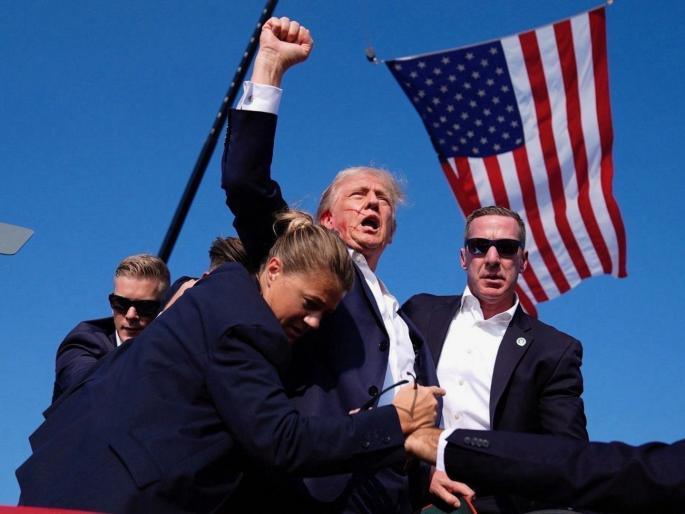 Donald Trump on his assassination attempt says i heard firing sound bullet pierced my right ear | Donald Trump : "मी गोळीबाराचा आवाज ऐकला, गोळी कानाला लागून गेली; खूप रक्तस्त्राव झाला, तेव्हा मला वाटलं..." Donald Trump on his assassination attempt says i heard firing sound bullet pierced my right ear | Donald Trump : "मी गोळीबाराचा आवाज ऐकला, गोळी कानाला लागून गेली; खूप रक्तस्त्राव झाला, तेव्हा मला वाटलं..."