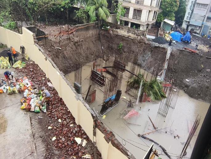 A large pit for the construction of a building A neighboring building is in danger | इमारतीच्या बांधकामासाठी भला मोठा खड्डा; शेजारच्या इमारतीला निर्माण झाला धोका A large pit for the construction of a building A neighboring building is in danger | इमारतीच्या बांधकामासाठी भला मोठा खड्डा; शेजारच्या इमारतीला निर्माण झाला धोका