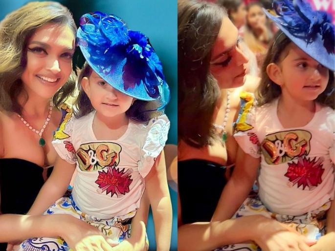 Who is this cute girl sitting on Deepika Padukone's lap in the photo ? | चॅलेंज ! Deepika Padukoneच्या मांडीवर बसलेली ही गोंडस मुलगी कुणाची, ओळखून दाखवा