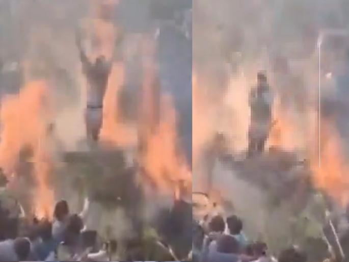 Uttar Pradesh: Shocking incident; Young man jumps into burning Holi, watch video | धक्कादायक प्रकार; जळत्या होळीत तरुणाने मारली उडी, पुढे...पाहा Video Uttar Pradesh: Shocking incident; Young man jumps into burning Holi, watch video | धक्कादायक प्रकार; जळत्या होळीत तरुणाने मारली उडी, पुढे...पाहा Video