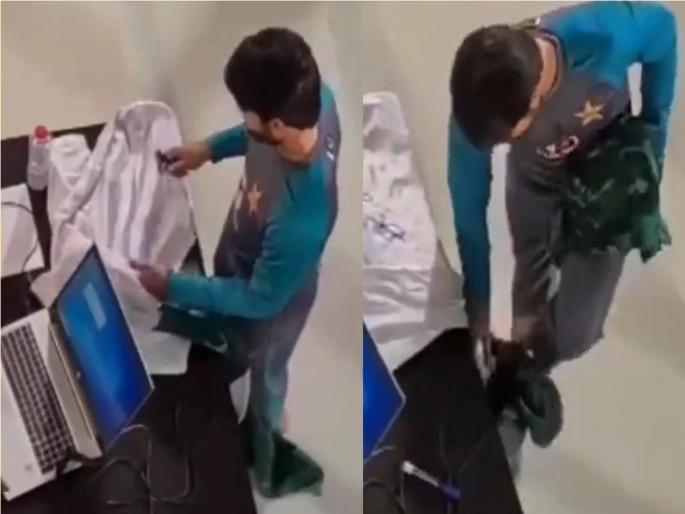 video of Pakistani player Mohammad Rizwan lifting the national flag of Pakistan with his feet is going viral  | VIDEO: मोहम्मद रिझवानने पायाने उचलला पाकिस्तानचा झेंडा, व्हिडीओ होतोय व्हायरल 