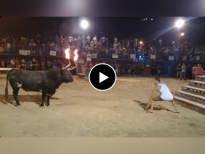 Viral video of angry bull attacked on man video goes viral on social media | 'आला अंगावर अन् घेतला शिंगावर'... बैलाशी पंगा घेणाऱ्या तरूणाच्या आले अंगाशी; Video पाहून नेटकरी हैराण  Viral video of angry bull attacked on man video goes viral on social media | 'आला अंगावर अन् घेतला शिंगावर'... बैलाशी पंगा घेणाऱ्या तरूणाच्या आले अंगाशी; Video पाहून नेटकरी हैराण