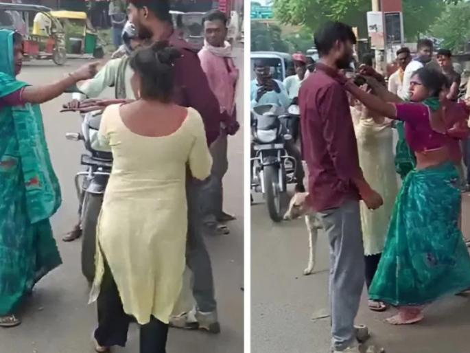VIRAL: Man walks out of hotel holding girlfriend's hand; wife washes him on the road as soon as she sees him! Video goes viral | VIRAL : गर्लफ्रेंडच्या हातात हात घालून हॉटेल बाहेर आला; पत्नीने बघताच भर रस्त्यात धुतला! व्हिडीओ व्हायरल VIRAL: Man walks out of hotel holding girlfriend's hand; wife washes him on the road as soon as she sees him! Video goes viral | VIRAL : गर्लफ्रेंडच्या हातात हात घालून हॉटेल बाहेर आला; पत्नीने बघताच भर रस्त्यात धुतला! व्हिडीओ व्हायरल