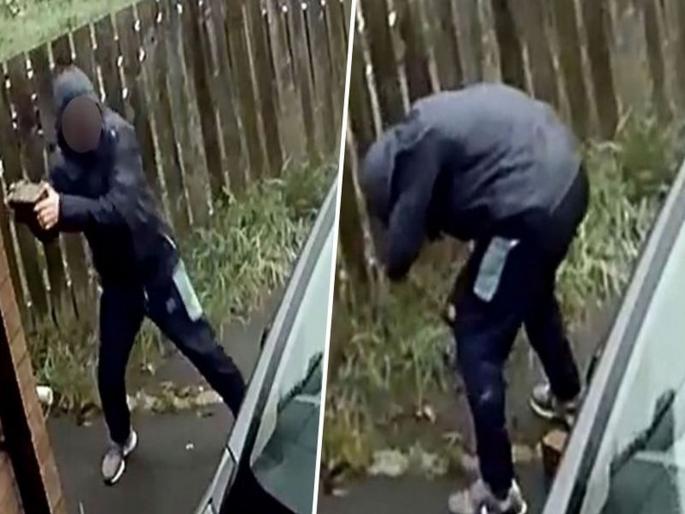 Man throws brick at car it bounces back to hit him in the face watch video | कर्मा इज बॅक... गाडी चोरण्याचा प्रयत्न करणाऱ्या चोराला अशी मिळाली शिक्षा Man throws brick at car it bounces back to hit him in the face watch video | कर्मा इज बॅक... गाडी चोरण्याचा प्रयत्न करणाऱ्या चोराला अशी मिळाली शिक्षा