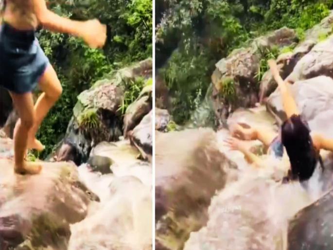 Viral Video: Playing with life for a reel; Young woman stands on a waterfall, what happened next will make you heartbroken | Viral Video : रीलसाठी जीवाशी खेळ; धबधब्यावर उभी राहिली तरुणी, पुढे जे झालं ते बघून चुकेल काळजाचा ठोका