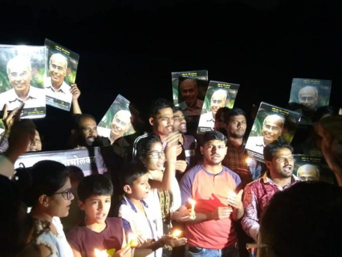 candle march for narendra dabholkar at maharshi ramji shinde bridge | जवाब दाे जवाब दाे....माेदी सरकार जवाब दाे candle march for narendra dabholkar at maharshi ramji shinde bridge | जवाब दाे जवाब दाे....माेदी सरकार जवाब दाे