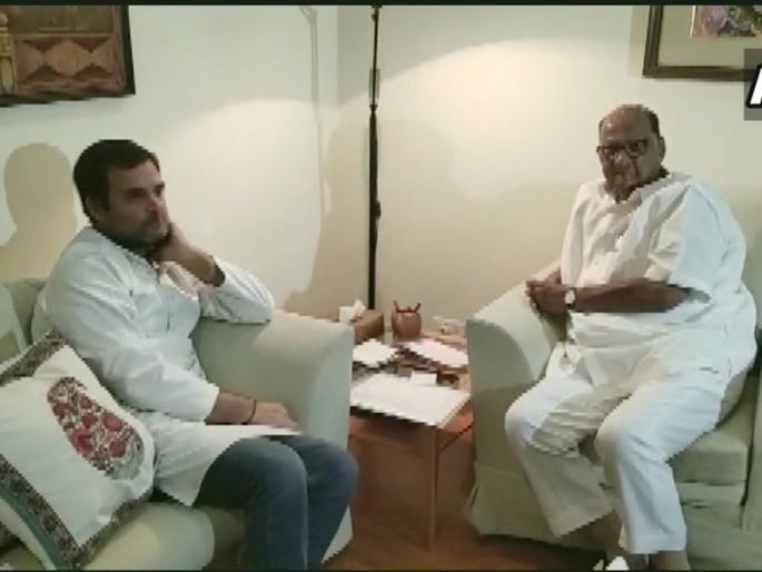 Congress President Rahul Gandhi meets NCP leader Sharad Pawar at Pawar's residence in Delhi. | पर्याय नसताना मैदान सोडणे योग्य नाही; शरद पवारांनी राहुल गांधीचे कान टोचले! Congress President Rahul Gandhi meets NCP leader Sharad Pawar at Pawar's residence in Delhi. | पर्याय नसताना मैदान सोडणे योग्य नाही; शरद पवारांनी राहुल गांधीचे कान टोचले!