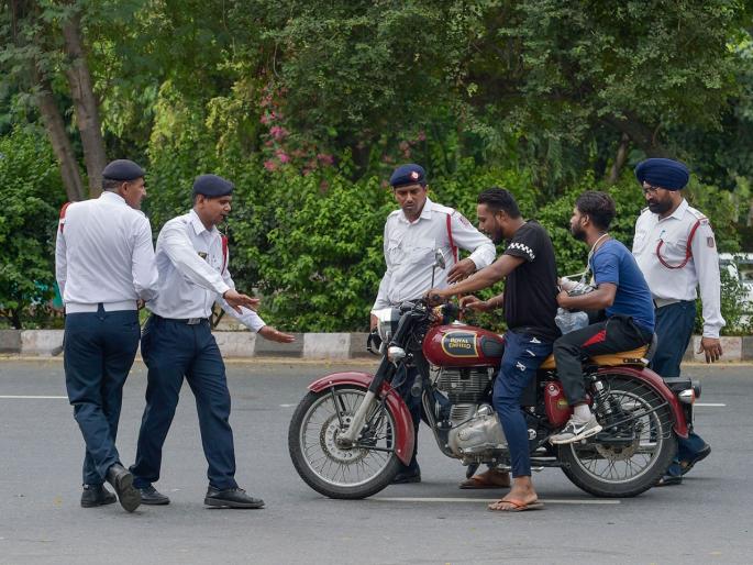 If you think india traffic fines are high, here's look at what you would pay in some countries | मोटार वाहन कायद्यातील दंड जास्त वाटतोय?; मग 'हे' आकडे पाहून हादरालच! If you think india traffic fines are high, here's look at what you would pay in some countries | मोटार वाहन कायद्यातील दंड जास्त वाटतोय?; मग 'हे' आकडे पाहून हादरालच!