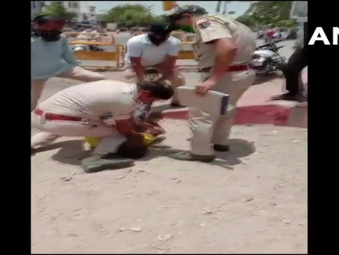 Video: Police in Jodhpur give legs to neck for not wearing mask; Netizens remember George Floyd | Video : मास्क घातला नाही म्हणून जोधपूरमधील पोलिसाने दिला गळ्यावर पाय; नेटिझन्सना आठवला जॉर्ज फ्लॉईड