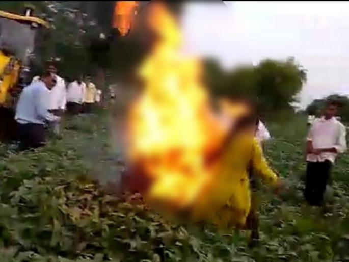 JCB removes soybean crop; Attempted self-immolation by a farmer woman | सोयाबीनचं पीक जेसीबीने हटवलं; शेतकरी महिलेने केला आत्मदहनाचा प्रयत्न  JCB removes soybean crop; Attempted self-immolation by a farmer woman | सोयाबीनचं पीक जेसीबीने हटवलं; शेतकरी महिलेने केला आत्मदहनाचा प्रयत्न