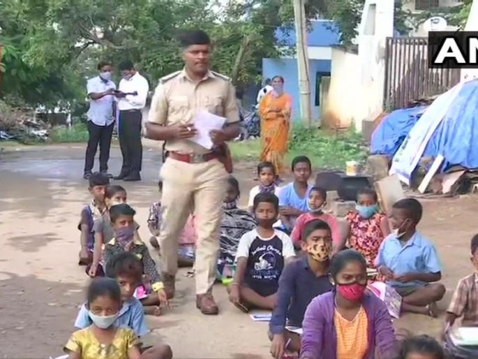 bengaluru sub inspector teaches children of migrant workers | कडक सॅल्यूट! 'मजुरांच्या मुलांवर मजुरीची वेळ येऊ नये म्हणून...', शिक्षणासाठी पोलिसाचा पुढाकार bengaluru sub inspector teaches children of migrant workers | कडक सॅल्यूट! 'मजुरांच्या मुलांवर मजुरीची वेळ येऊ नये म्हणून...', शिक्षणासाठी पोलिसाचा पुढाकार