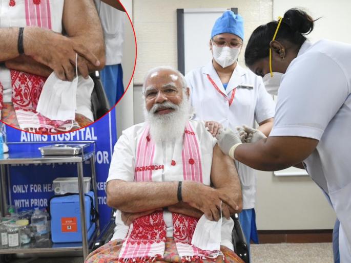 pm modi took his first dose of covid 19 this is how people are reaction on twitter over mask | फोटोसाठी काय पण! मोदींनी लस घेताना मास्क न लावल्याने खवळले नेटीझन्स, करून दिली 'ही' आठवण pm modi took his first dose of covid 19 this is how people are reaction on twitter over mask | फोटोसाठी काय पण! मोदींनी लस घेताना मास्क न लावल्याने खवळले नेटीझन्स, करून दिली 'ही' आठवण